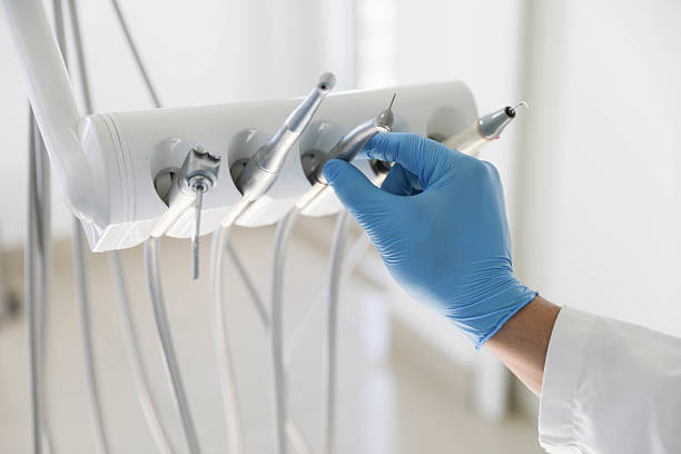 Professional Tooth Extraction technician working in Red Bank, NJ